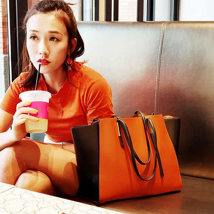 حقيبة يد كبيرة من الجلد الصناعي ,Large faux leather handbag